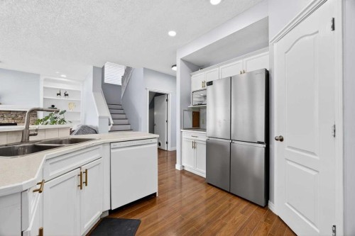 162 Prestwick Landing Se, Calgary, AB - Indoor Photo Showing Kitchen With Double Sink