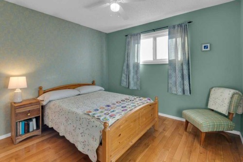 44 Sprucegrove Crescent Se, Airdrie, AB - Indoor Photo Showing Bedroom