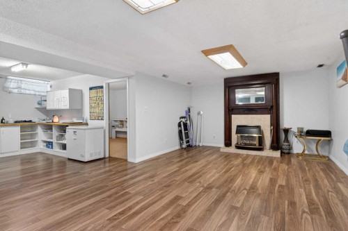 5122 48 Street Nw, Calgary, AB - Indoor With Fireplace