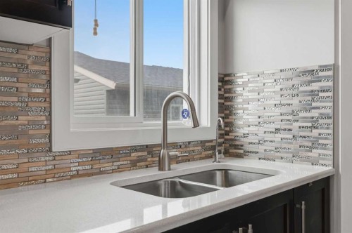 8 Evanscrest Way Nw, Calgary, AB - Indoor Photo Showing Kitchen With Double Sink