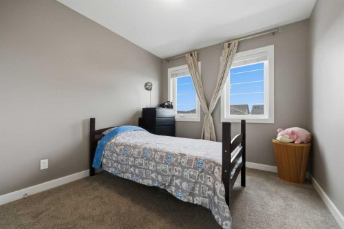 8 Evanscrest Way Nw, Calgary, AB - Indoor Photo Showing Bedroom