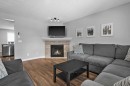 564 Morningside Park Sw, Airdrie, AB  - Indoor Photo Showing Living Room With Fireplace 