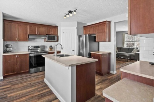 564 Morningside Park Sw, Airdrie, AB - Indoor Photo Showing Kitchen