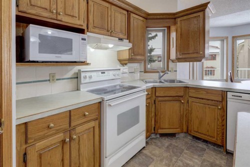 232 Hampshire Place Nw, Calgary, AB - Indoor Photo Showing Kitchen With Double Sink
