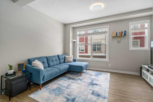 37 New Brighton Point Se, Calgary, AB - Indoor Photo Showing Living Room