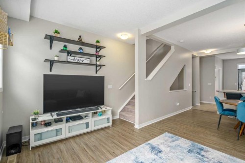 37 New Brighton Point Se, Calgary, AB - Indoor Photo Showing Living Room