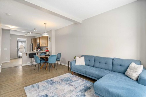 37 New Brighton Point Se, Calgary, AB - Indoor Photo Showing Living Room