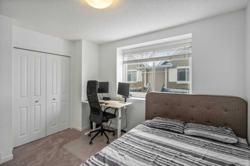 37 New Brighton Point Se, Calgary, AB - Indoor Photo Showing Bedroom