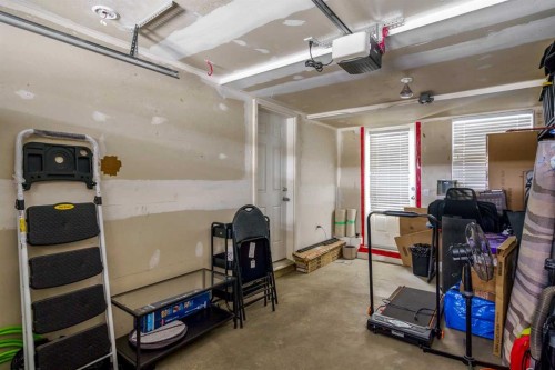 37 New Brighton Point Se, Calgary, AB - Indoor Photo Showing Garage