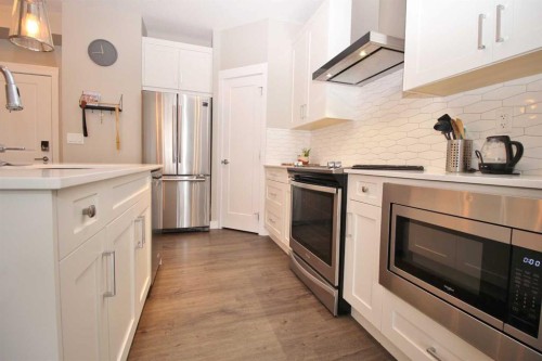 211-200 Auburn Meadows Common Se, Calgary, AB - Indoor Photo Showing Kitchen With Stainless Steel Kitchen With Upgraded Kitchen