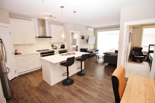 211-200 Auburn Meadows Common Se, Calgary, AB - Indoor Photo Showing Kitchen With Stainless Steel Kitchen With Double Sink With Upgraded Kitchen