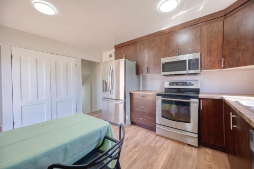 1176 Penrith Crescent Se, Calgary, AB - Indoor Photo Showing Kitchen With Stainless Steel Kitchen