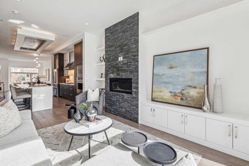 1765 7 Avenue Nw, Calgary, AB - Indoor Photo Showing Living Room With Fireplace