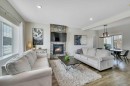 57 Hampton Crescent, Sylvan Lake, AB  - Indoor Photo Showing Living Room With Fireplace 