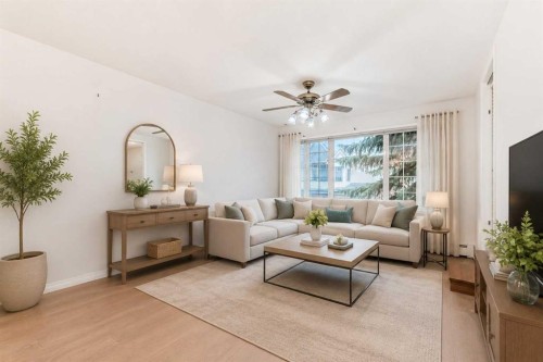 3202 Sienna Park Green Sw, Calgary, AB - Indoor Photo Showing Living Room