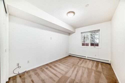 3202 Sienna Park Green Sw, Calgary, AB - Indoor Photo Showing Other Room