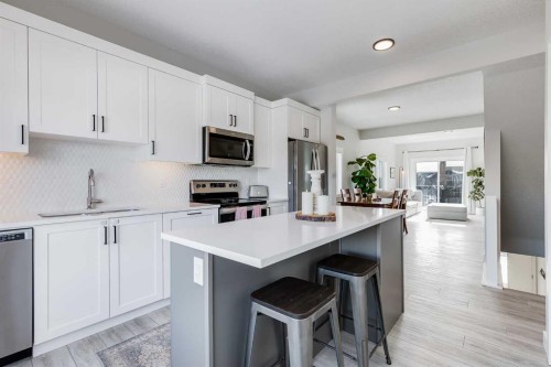 140 Tuscany Summit Square Nw, Calgary, AB - Indoor Photo Showing Kitchen With Stainless Steel Kitchen With Upgraded Kitchen
