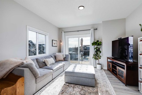 140 Tuscany Summit Square Nw, Calgary, AB - Indoor Photo Showing Living Room