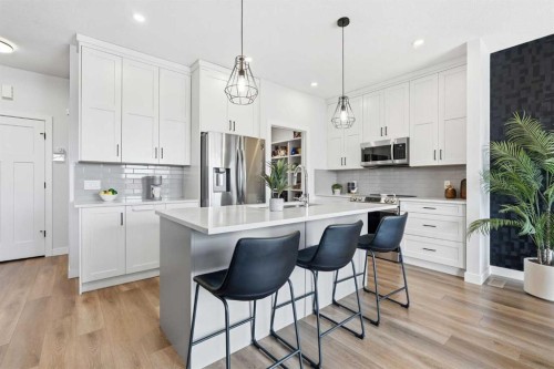 376 Fireside Way, Cochrane, AB - Indoor Photo Showing Kitchen With Upgraded Kitchen