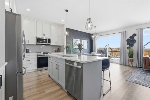 376 Fireside Way, Cochrane, AB - Indoor Photo Showing Kitchen With Upgraded Kitchen