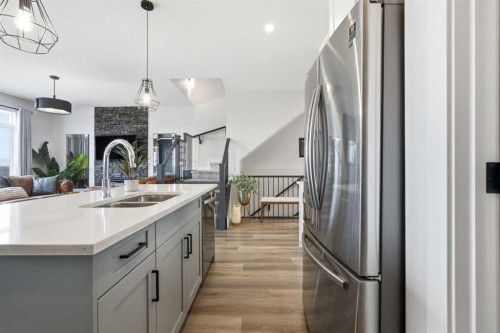 376 Fireside Way, Cochrane, AB - Indoor Photo Showing Kitchen With Double Sink With Upgraded Kitchen