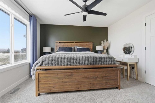 376 Fireside Way, Cochrane, AB - Indoor Photo Showing Bedroom