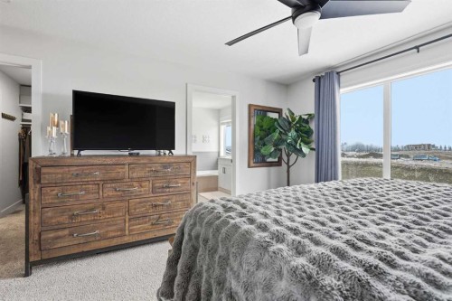 376 Fireside Way, Cochrane, AB - Indoor Photo Showing Bedroom