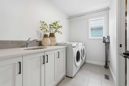 376 Fireside Way, Cochrane, AB - Indoor Photo Showing Laundry Room