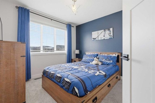 376 Fireside Way, Cochrane, AB - Indoor Photo Showing Bedroom