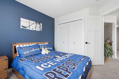 376 Fireside Way, Cochrane, AB - Indoor Photo Showing Bedroom