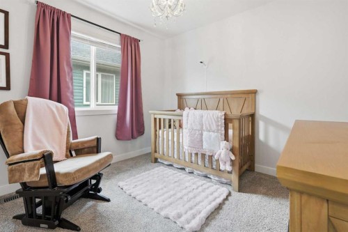 376 Fireside Way, Cochrane, AB - Indoor Photo Showing Bedroom