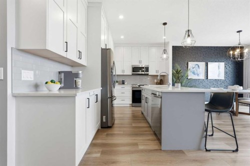 376 Fireside Way, Cochrane, AB - Indoor Photo Showing Kitchen With Upgraded Kitchen