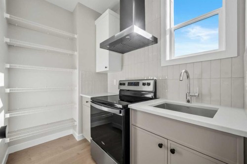 151 Dawson Wharf Mount, Chestermere, AB - Indoor Photo Showing Kitchen