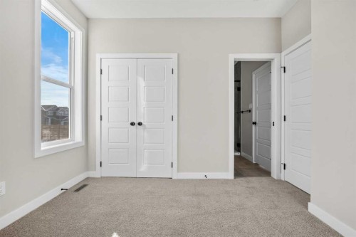 151 Dawson Wharf Mount, Chestermere, AB - Indoor Photo Showing Other Room