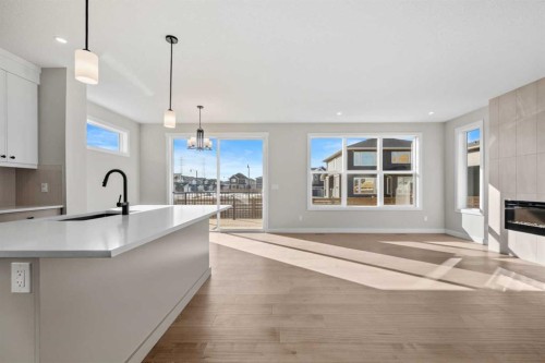 151 Dawson Wharf Mount, Chestermere, AB - Indoor With Fireplace