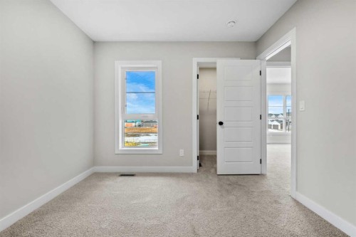 151 Dawson Wharf Mount, Chestermere, AB - Indoor Photo Showing Other Room