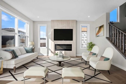 151 Dawson Wharf Mount, Chestermere, AB - Indoor Photo Showing Living Room With Fireplace