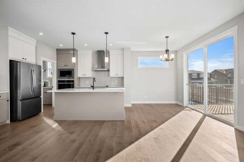 151 Dawson Wharf Mount, Chestermere, AB - Indoor Photo Showing Kitchen With Upgraded Kitchen
