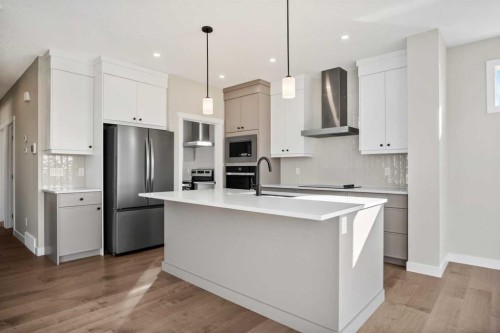 151 Dawson Wharf Mount, Chestermere, AB - Indoor Photo Showing Kitchen With Upgraded Kitchen