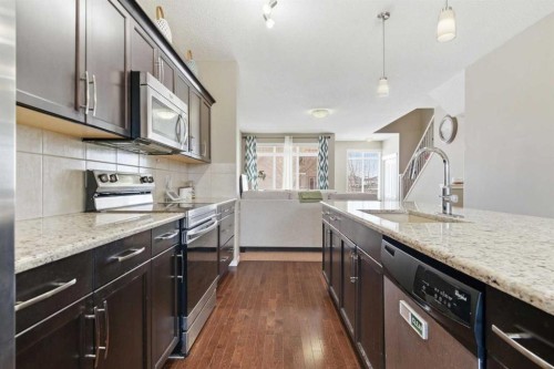 154 Cranford Park Se, Calgary, AB - Indoor Photo Showing Kitchen With Upgraded Kitchen