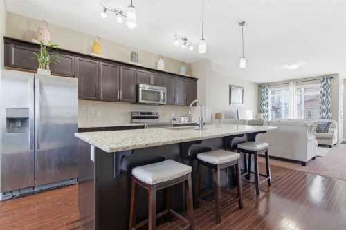 154 Cranford Park Se, Calgary, AB - Indoor Photo Showing Kitchen With Upgraded Kitchen