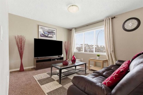 154 Cranford Park Se, Calgary, AB - Indoor Photo Showing Living Room