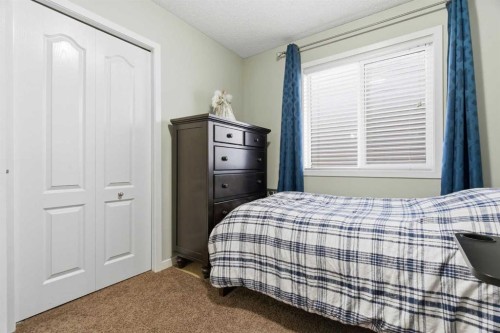 154 Cranford Park Se, Calgary, AB - Indoor Photo Showing Bedroom