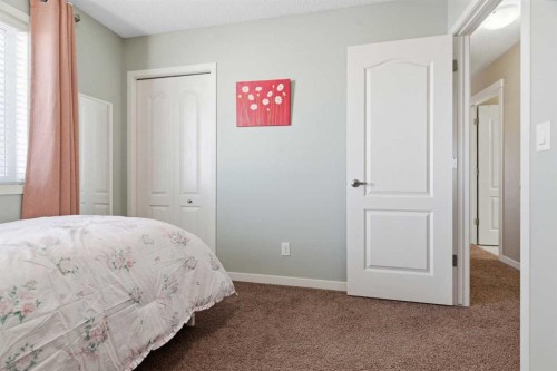 154 Cranford Park Se, Calgary, AB - Indoor Photo Showing Bedroom