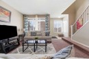154 Cranford Park Se, Calgary, AB  - Indoor Photo Showing Living Room 