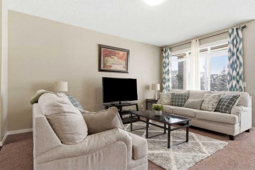 154 Cranford Park Se, Calgary, AB - Indoor Photo Showing Living Room