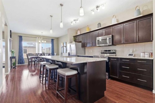 154 Cranford Park Se, Calgary, AB - Indoor Photo Showing Kitchen With Upgraded Kitchen