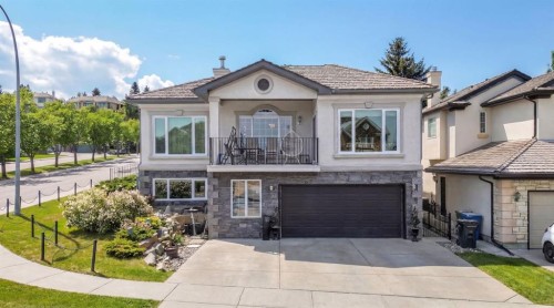 154 Sienna Ridge Landing Sw, Calgary, AB - Outdoor With Balcony With Facade