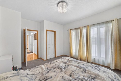154 Sienna Ridge Landing Sw, Calgary, AB - Indoor Photo Showing Bedroom