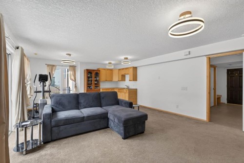 154 Sienna Ridge Landing Sw, Calgary, AB - Indoor Photo Showing Living Room